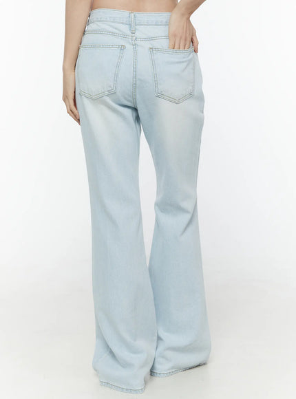 Ripley Light Washed Flared Jeans IL506 Light blue back waist-down shot on model showing rear patch pockets contrast stitching and wide flared leg hem