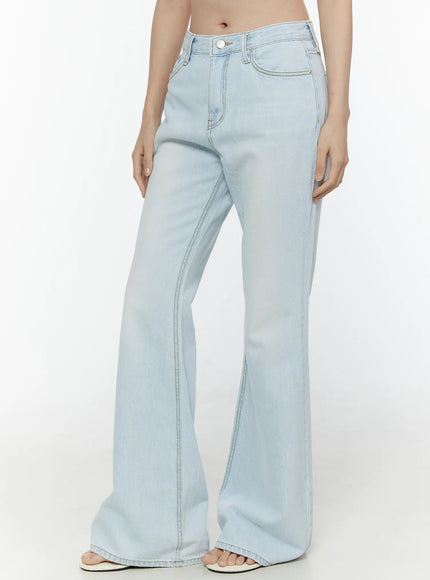 Ripley Light Washed Flared Jeans IL506 Light blue front detail shot on model showing waistband contrast stitching front pockets and wide flared leg silhouette