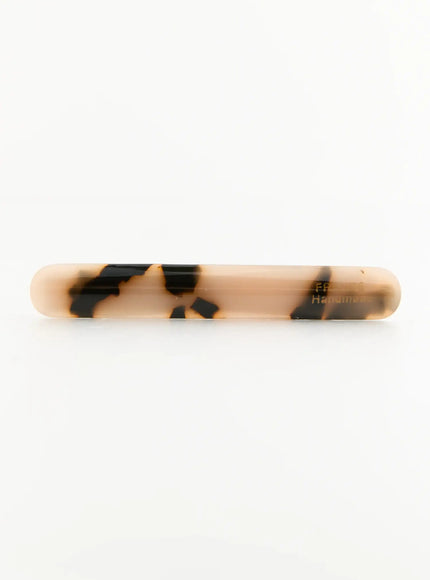 Rosie One Hair Clip IL503 Tortoise front view flat-lay, cream and black tortoiseshell resin body with France Handmade gold stamp