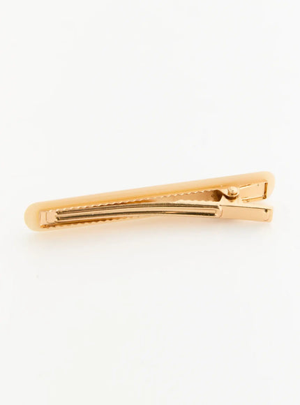 Rosie One Hair Clip IL503 Ivory back view flat-lay showing closed gold-tone metal clip mechanism with serrated teeth and hinge