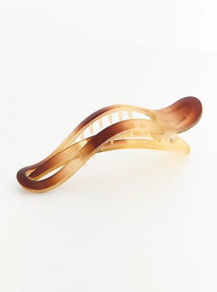 Ruby Hair Clip IL503 brown ombre angled view showing open wave body with dual-curl ends and warm caramel gradient resin texture