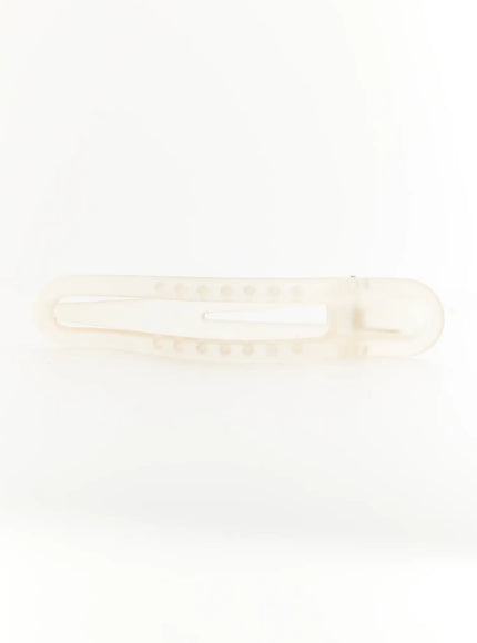Ruby Hair Clip IL503 ivory white close-up bottom flat view revealing slim oval cutout inner base and pearlescent surface