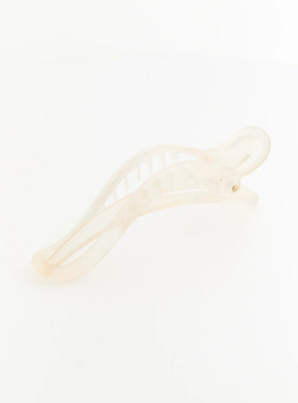 Ruby Hair Clip IL503 ivory white angled top view showing open wave body, rounded curl ends, and soft pearl sheen texture