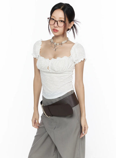 LEWKIN Ruffle Detailed Blouse CL527 White S/M front model shot wearing glasses with layered necklace and brown leather belt, textured puff sleeve top