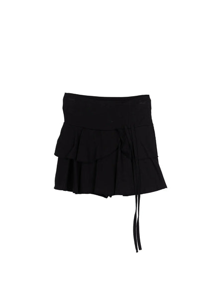 Ruffle Mini Skirt CL501 Black flat-lay showing double-tiered ruffle mini skirt with wide waistband and side string tie detail