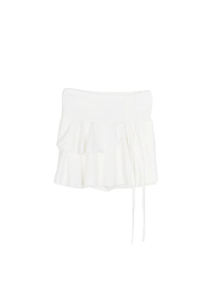 Ruffle Mini Skirt CL501 White flat-lay showing double-tiered ruffle mini skirt with folded waistband and dangling side string tie