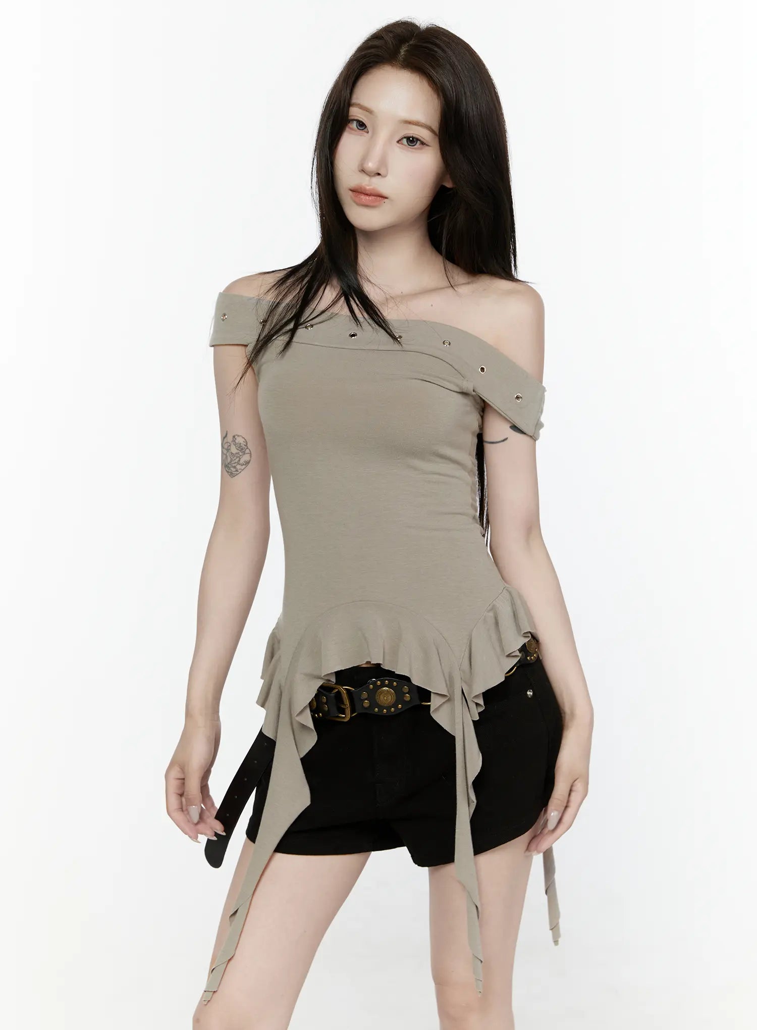 Ruffle Off-Shoulder Top IL521 Dark green three-quarter front model shot hands relaxed asymmetric ruffle peplum hem gold eyelet off-shoulder neckline detail