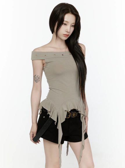 Ruffle Off-Shoulder Top IL521 Dark green front model shot gazing down holding belt ruffle peplum hem ribbon ties gold eyelet off-shoulder neckline