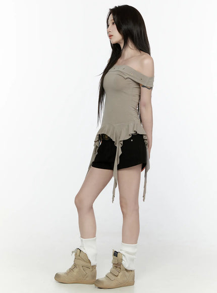 Ruffle Off-Shoulder Top IL521 Dark green side profile full-body model shot standing with sneakers leg warmers showing slim silhouette ruffle hem ribbon detail