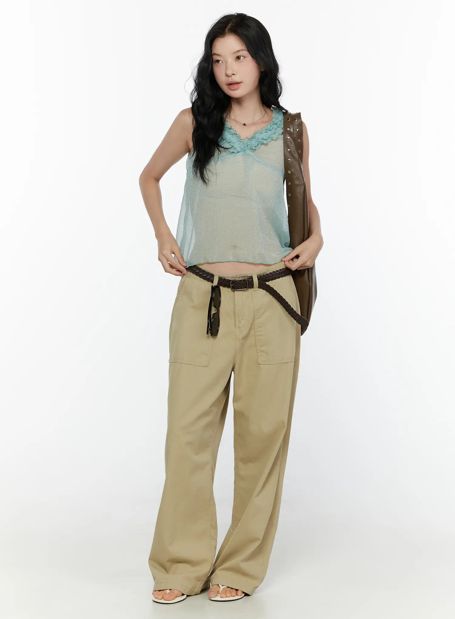 Ruffle V-Neck Sleeveless Top CL521 Mint full-body front shot on model styled with khaki wide-leg cargo pants braided belt and brown shoulder bag