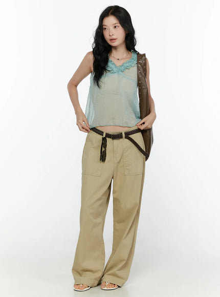 Ruffle V-Neck Sleeveless Top CL521 Mint full-body front shot on model styled with khaki wide-leg cargo pants braided belt and brown shoulder bag