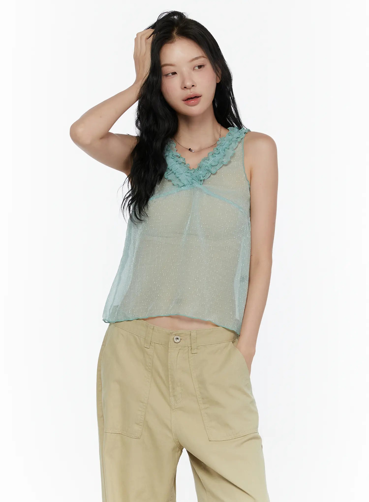 Ruffle V-Neck Sleeveless Top CL521 Mint upper-body front shot on model hand in hair showing sheer glitter fabric and ruffled V-neckline detail