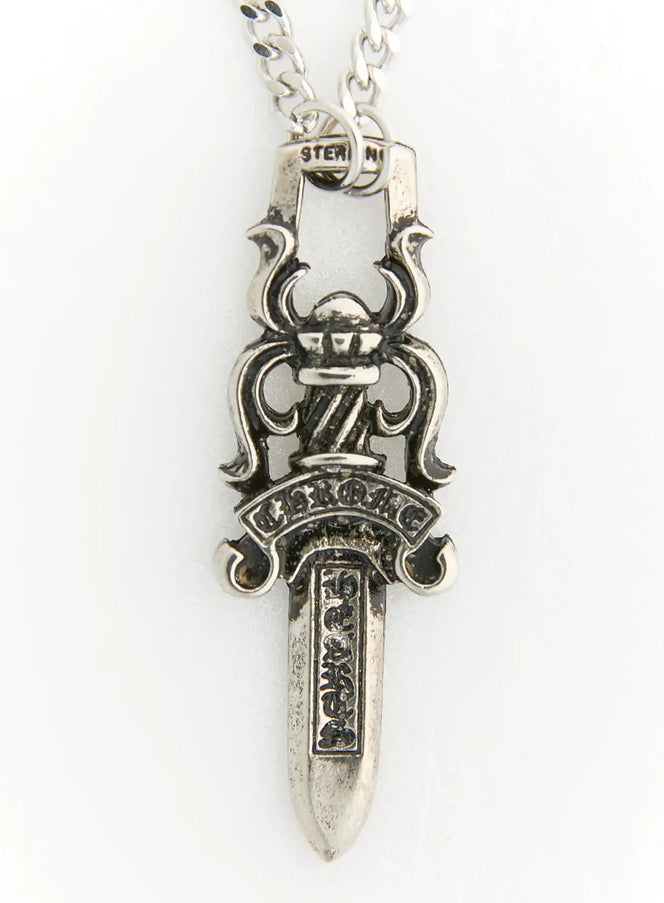 LEWKIN Shadow Sword Necklace IL522 Silver close-up of dagger pendant with Viking helmet motif, engraved banner detail, and aged sterling silver finish