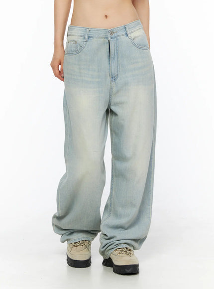 Shawn Washed Wide Leg Jeans CL501 Light blue front shot on model showing full leg length wide balloon silhouette faded wash and hem pooling over sneakers