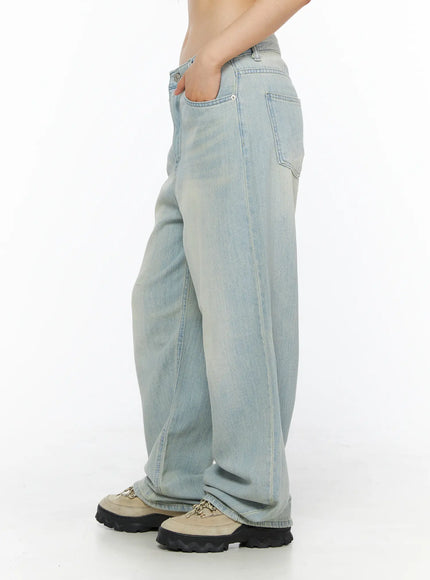 Shawn Washed Wide Leg Jeans CL501 Light blue side shot on model hand in pocket showing relaxed wide leg silhouette and faded wash texture