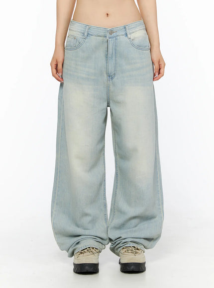 LEWKIN Shawn Washed Wide Leg Jeans CL501 Light blue Size S front crop shot on model showing low-rise waistband button closure and faded wash wide leg denim