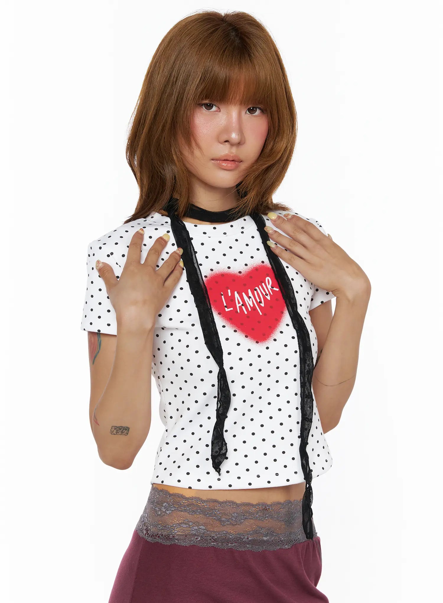 Sheer Floral Pattern Scarf CL503 Black front view on model wearing white polka dot crop tee with black lace scarf at neckline hands framing chest
