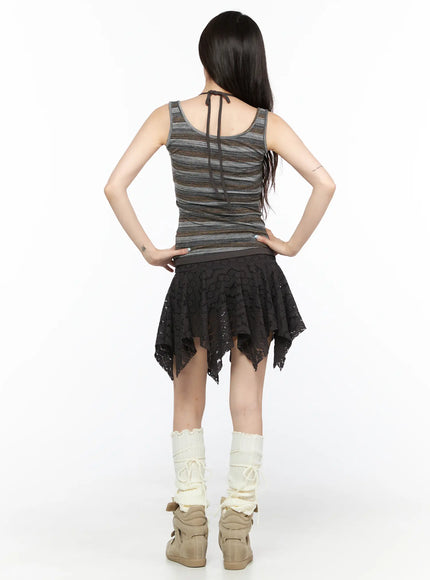 Sheer Lace Asymmetric Mini Skirt CL523 Dark brown full-body back shot on model showing back view of floral lace skirt and tie detail on tank with cream leg warmers