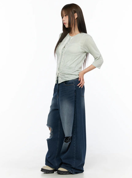 Sheer Lace Detail Cardigan CL514 Light green side model shot size S/M showing semi-sheer knit texture lace placket and 3/4 sleeves with wide-leg jeans