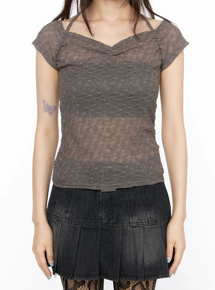 Sheer Lace Halter Off-Shoulder Tee CL522 Dark beige close-up front torso shot on model showing V-neckline sheer lace pattern spaghetti strap and cap sleeve construction