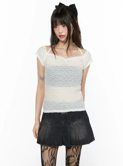 Sheer Lace Halter Off-Shoulder Tee CL522 ivory front view on model with square neckline sheer lace texture styled with black denim mini skirt and fishnet tights