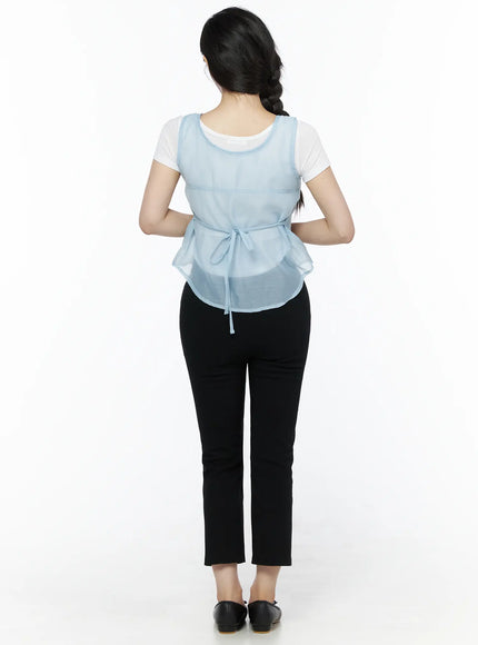 Sheer Layered Blouse IU525 Light blue back full-body model shot, sheer chiffon vest with adjustable back drawstring tie over white tee and black trousers