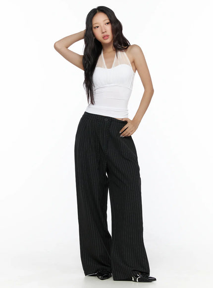 Sheer Layered Halter Top CL513 White full-body front model shot with hand in hair, ruched cropped top with sheer strap, styled with black pinstripe wide-leg trousers