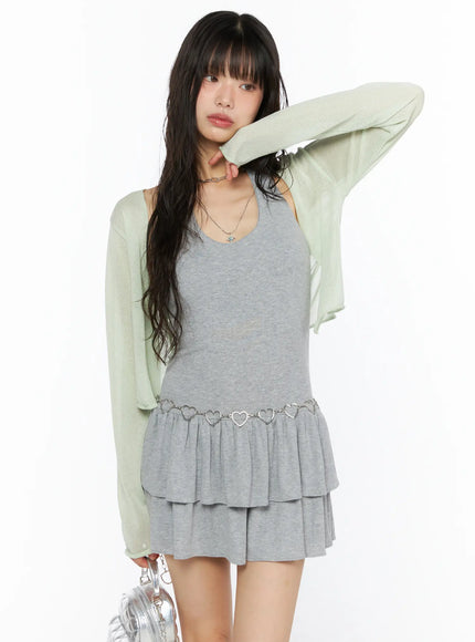 LEWKIN Sheer Lightweight Knit Cardigan CU530 Light green front view on model size S/M styled over gray ruffle mini dress with silver heart chain belt and silver mini bag