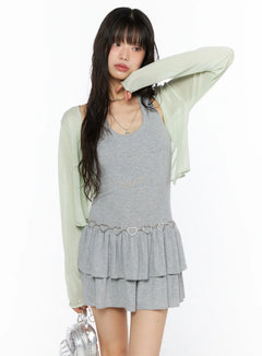 LEWKIN Sheer Lightweight Knit Cardigan CU530 Light green front view on model size S/M styled over gray ruffle mini dress with silver heart chain belt and silver mini bag