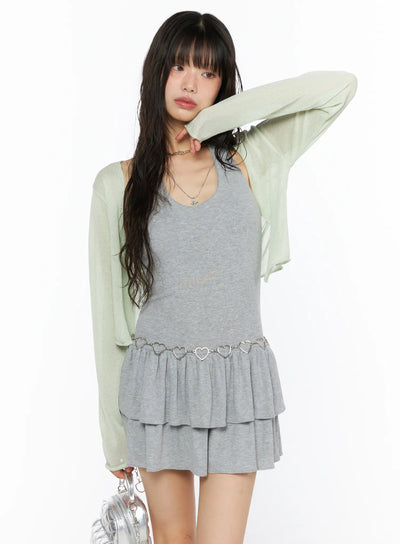 LEWKIN Sheer Lightweight Knit Cardigan CU530 Light green front view on model size S/M styled over gray ruffle mini dress with silver heart chain belt and silver mini bag
