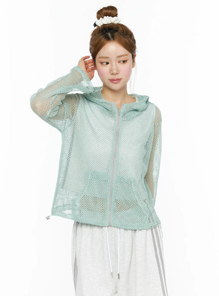 Sheer Mesh Hoodie CL501 Mint front model shot three-quarter view model hand near ear showing silver zip sheer open-knit mint mesh hoodie