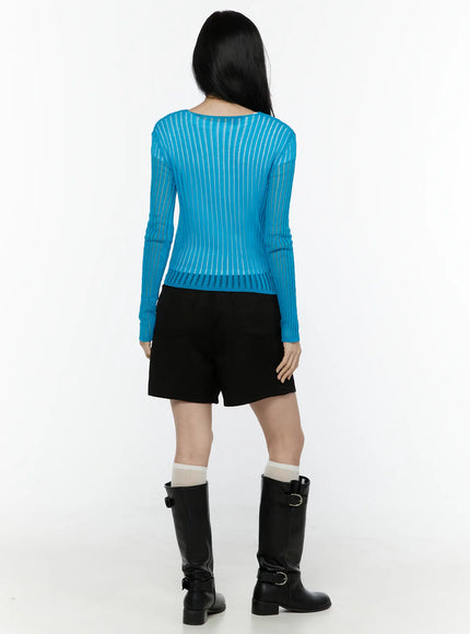 Sheer Ribbed Cardigan IL506 Blue back shot on model showing semi-sheer ribbed knit construction vertical stripe pattern and cropped silhouette with long sleeves