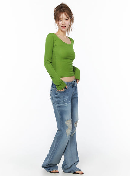 Sheer Slim Fit Long Sleeve Top IU525 Green three-quarter front view on model full body styled with wide-leg ripped jeans and sandals ribbed crop silhouette
