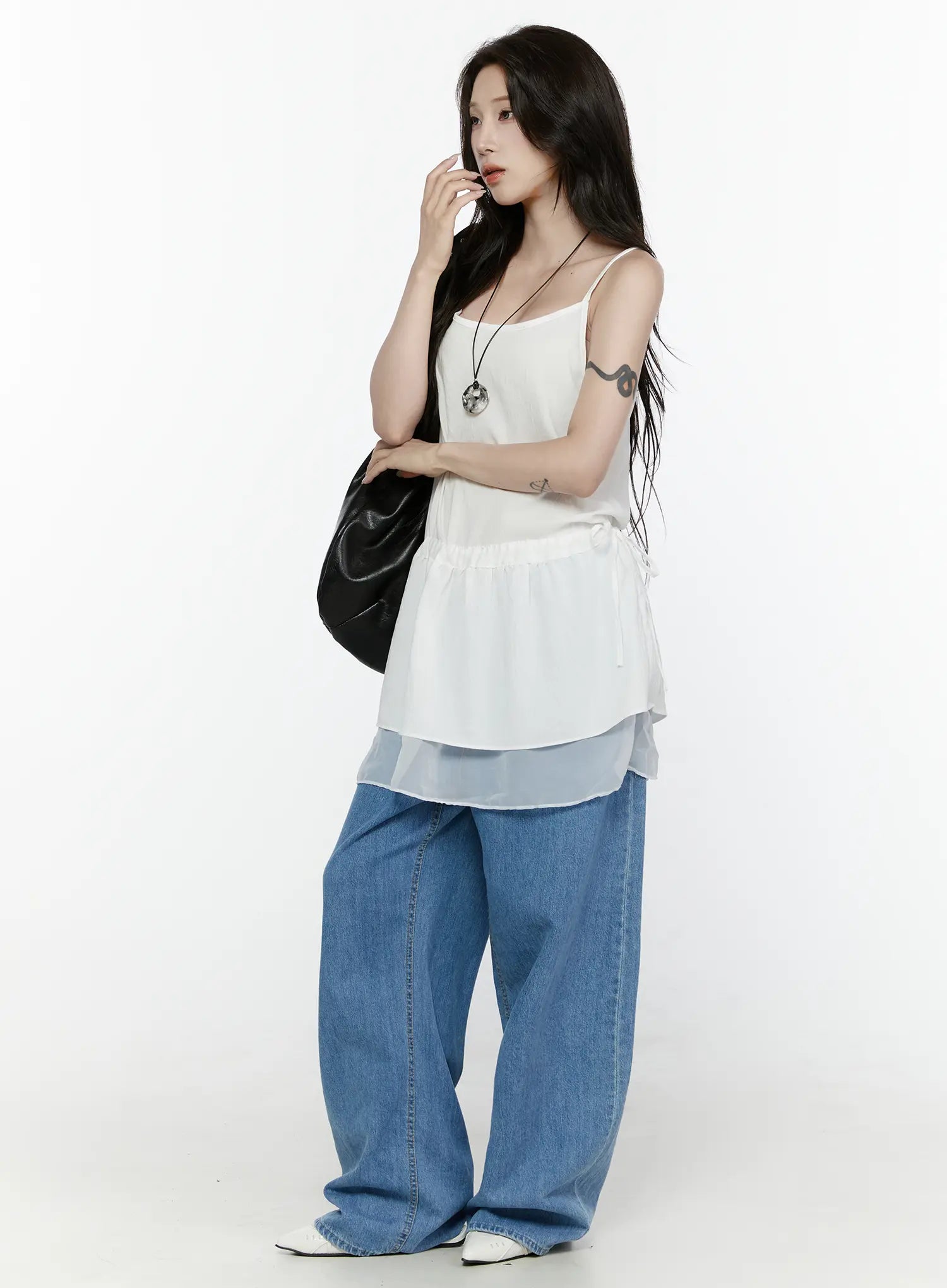 Sheer Strap Layered Dress IL521 White full-length side-angle view on model styled with black leather tote bag, pendant necklace, and wide-leg blue jeans