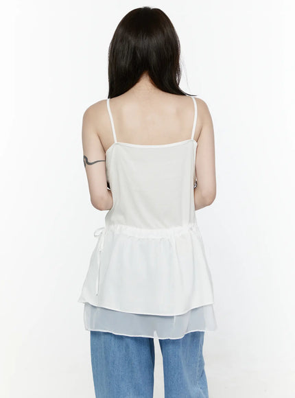 Sheer Strap Layered Dress IL521 White back view on model revealing spaghetti straps, open back, gathered peplum, drawstring waist bow, and sheer organza underlayer