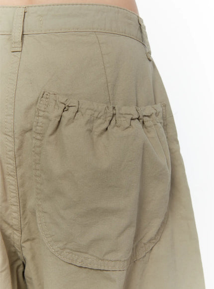 Shirred Balloon Cotton Trousers CL507 Dark green back view on model showing rear patch pockets with shirring detail and wide balloon leg pooling at hem