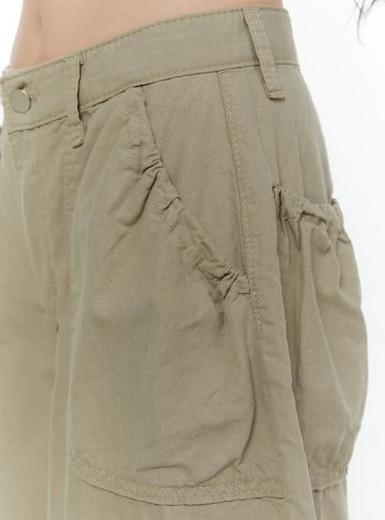 Shirred Balloon Cotton Trousers CL507 Dark green side close-up detail showing shirred pocket opening and gathered cotton fabric texture