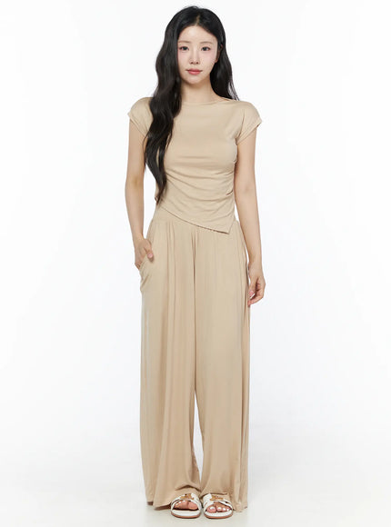 Shirred Boat Neck Tee and Sweatpants Set IU525 Beige full-length front shot on model, boat neck ruched cap-sleeve top with asymmetric hem and wide-leg pants
