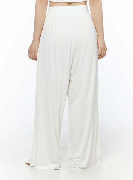 Shirred Boat Neck Tee and Sweatpants Set IU525 White back close-up on model, wide-leg sweatpants showing elastic waistband and flowy pleated back panel
