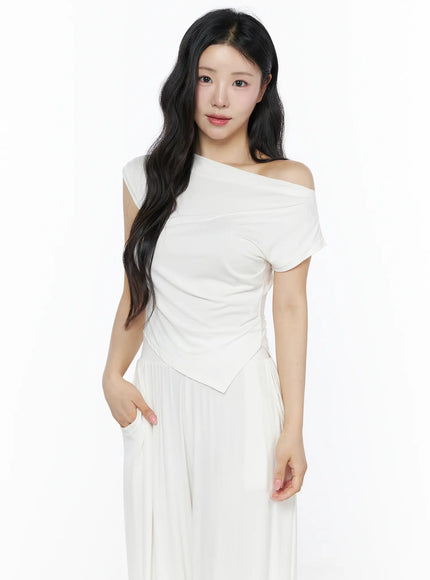 Shirred Boat Neck Tee and Sweatpants Set IU525 White front close-up on model showing ruched drape detail, asymmetric hem, and off-shoulder neckline