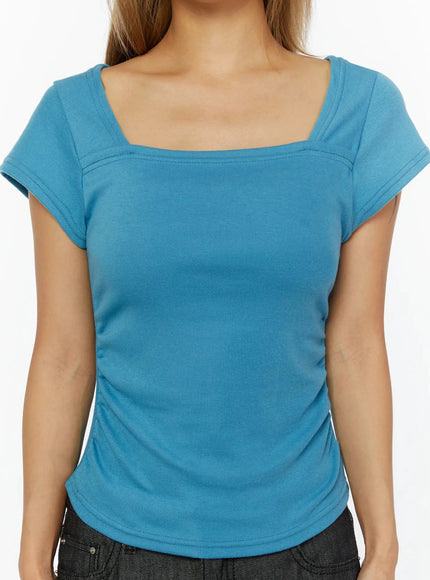 Shirred Cap Sleeve Top IL524 Blue close-up front detail shot showing square neckline topstitching ruched side seams and cap sleeves