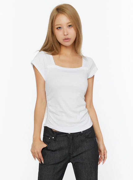 Shirred Cap Sleeve Top IL524 White front shot on model with square neckline cap sleeves fitted ribbed knit tucked into dark denim