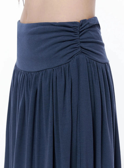 Shirred Flare Maxi Skirt IL502 Dark blue close-up detail of ruched waistband side panel and gathered pleats at hipline, soft jersey fabric texture