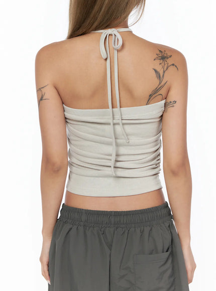 Shirred Strap Tube Top CU523 Light beige S/M close-up back model shot showing open back open halter cord tie and horizontal ruched ribbed fabric