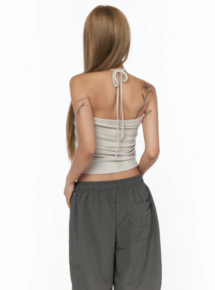 Shirred Strap Tube Top CU523 Light beige S/M close-up back detail showing halter tie cord and ruched gathered fabric texture on model