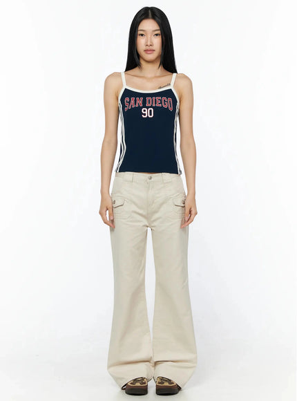 Side Stripe Contrast Trim Cami Top IL516 Dark blue full-length front model shot standing straight arms at sides styled with beige flare cargo pants and platform sandals