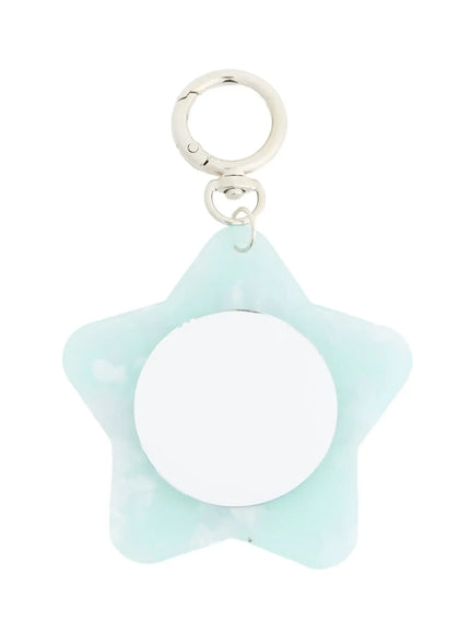 Sienna Stra Compact Mirror IL503 Mint close-up front detail showing translucent star-shaped acrylic body round mirror and polished silver carabiner ring clasp