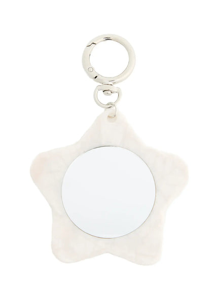 Sienna Stra Compact Mirror IL503 White close-up front detail showing pearlescent star-shaped body round mirror surface and polished silver carabiner ring