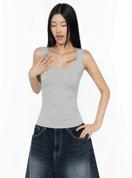 Silky Round Neck Tank Top IL509 Gray front shot model touching chest scoop neckline ribbed fitted stretch fabric paired with dark denim