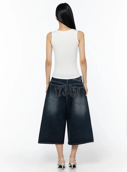 Silky Round Neck Tank Top IL509 White back shot model showing rear view fitted tank top back detail with wide-leg denim culottes back pockets waistband logo